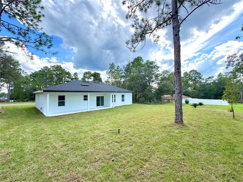 Exterior details and patio area of a home in , Citrus Springs (Image 18).
