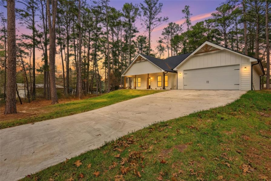 Front exterior of a new home in , Brookeland, TX, highlighting curb appeal (Image 19).