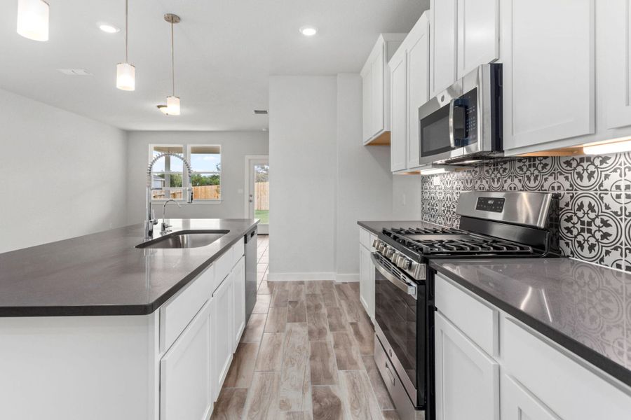 Furnished interior view inside a new home in Weston Oaks, San Antonio (Image 7).