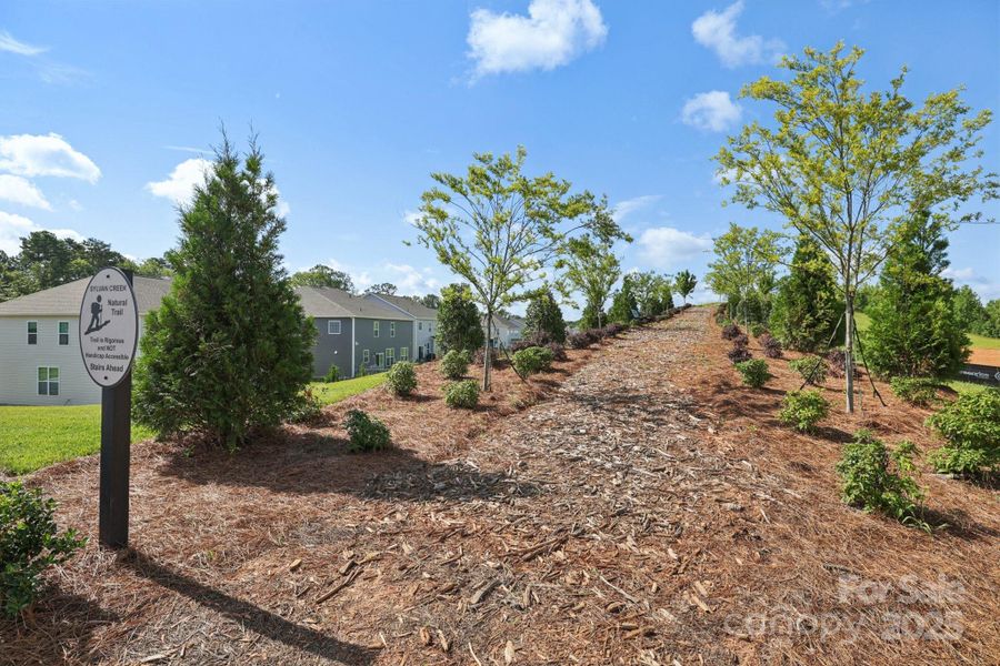 Front exterior of a new home in Sylvan Creek, Denver, NC, highlighting curb appeal (Image 2).