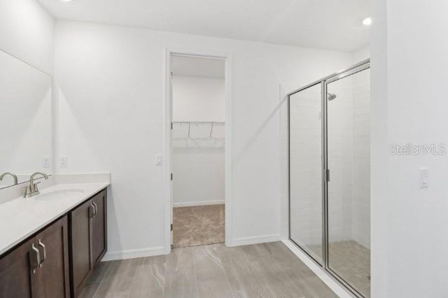 Furnished interior view inside a new home in Northlake at Ovation, Winter Garden (Image 10).