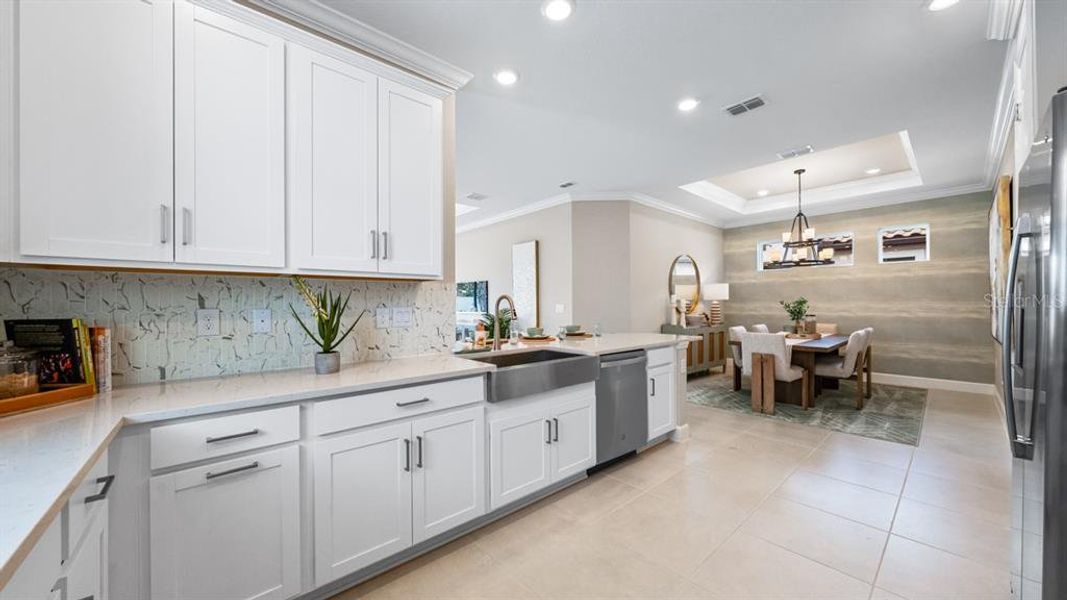 Furnished interior view inside a new home in Esplanade at Wiregrass Ranch, Wesley Chapel (Image 13).