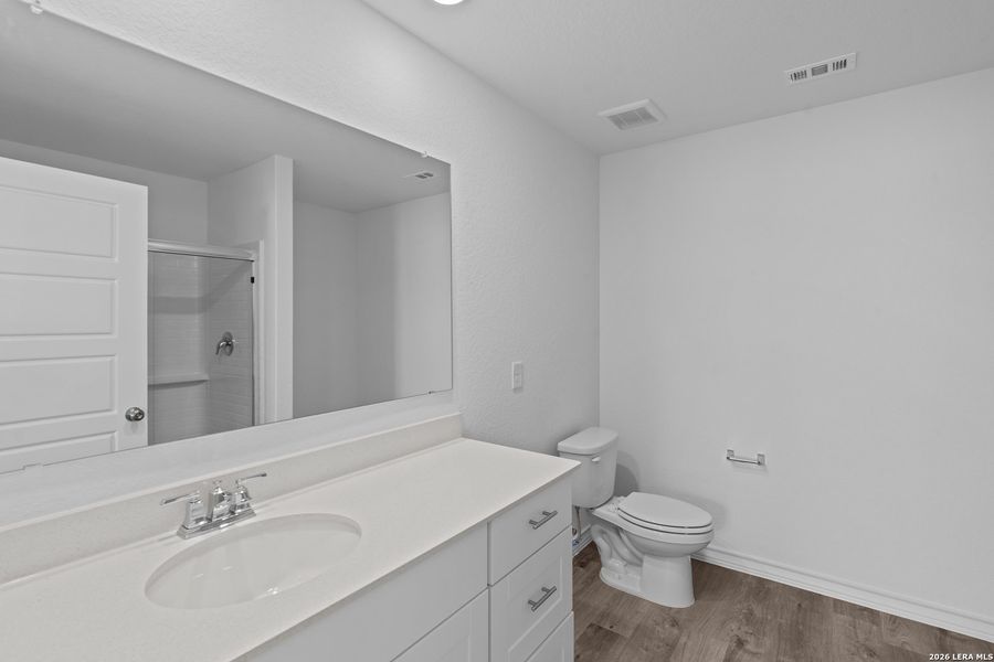 Furnished interior view inside a new home in Cinco Lakes, San Antonio (Image 8).