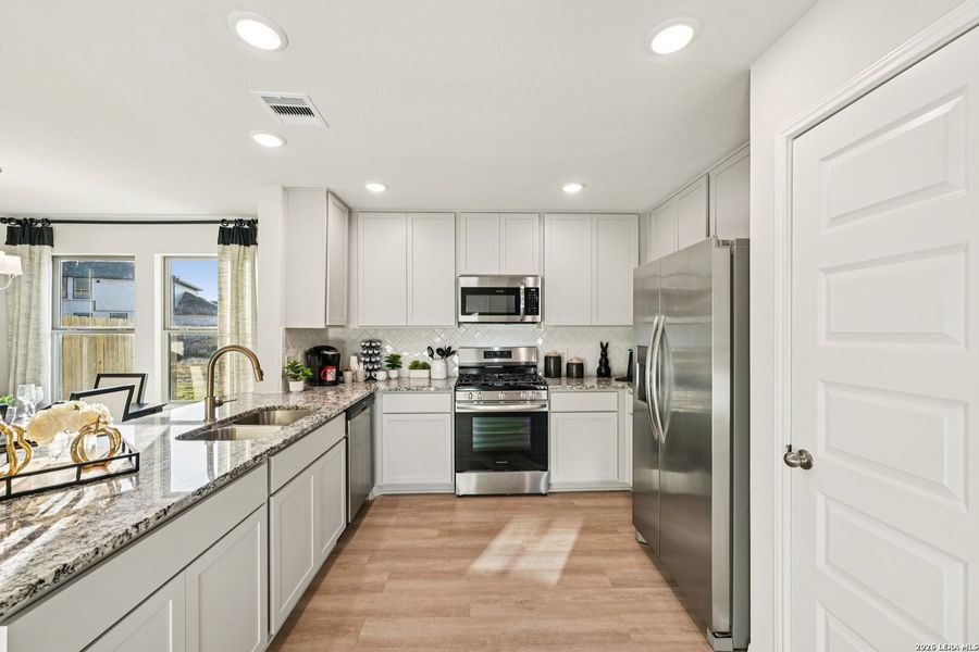 Furnished interior view inside a new home in Red Hawk Landing, San Antonio (Image 15).
