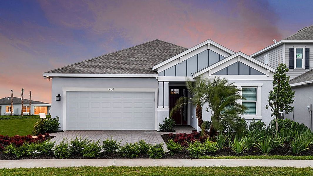 Representative exterior photo of a completed home built from the Grenada by Taylor Morrison in The Cove at West Port, Port Charlotte, FL (Image 18).