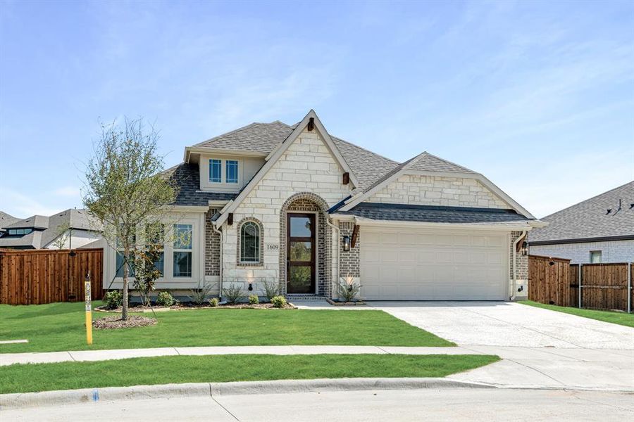 Front exterior of a new home in Willow Wood Classic 50, McKinney, TX, highlighting curb appeal (Image 23). Front exterior of a new home in Willow Wood Classic 50, McKinney, TX, highlighting curb appeal (Image 23).