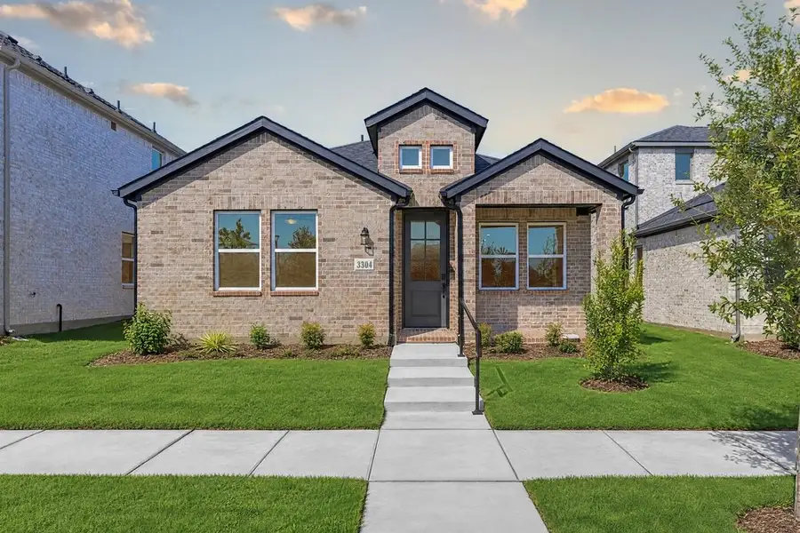 Front exterior of a new home in North Sky Celina, Celina, TX, highlighting curb appeal (Image 18). Front exterior of a new home in North Sky Celina, Celina, TX, highlighting curb appeal (Image 18).