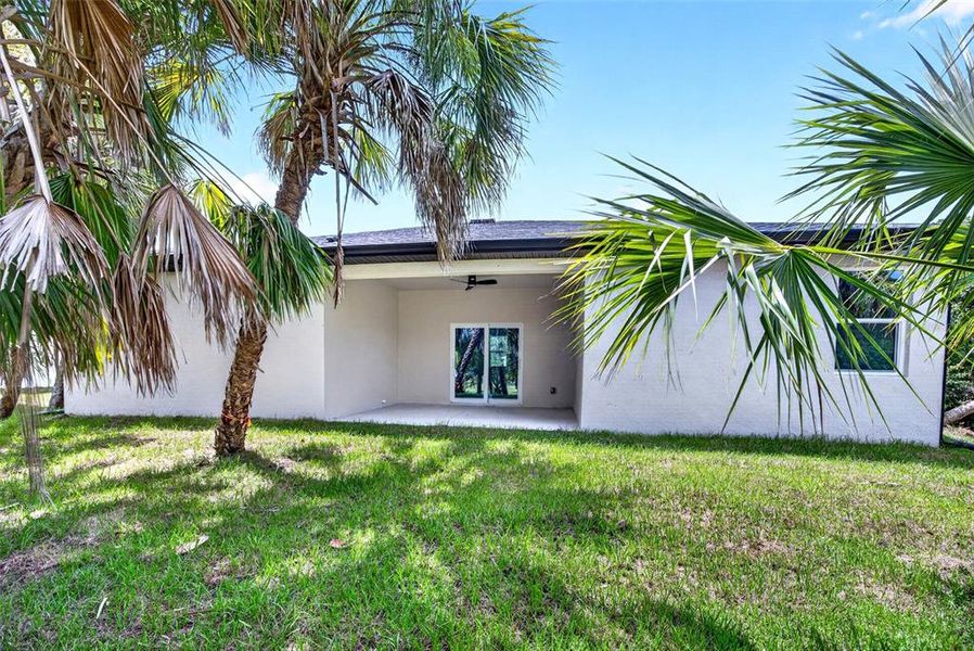Exterior details and patio area of a home in , North Port (Image 18).