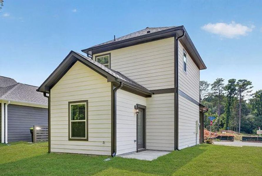 Exterior details and patio area of a home in The Cottages at East Lanier, Fayetteville (Image 4).