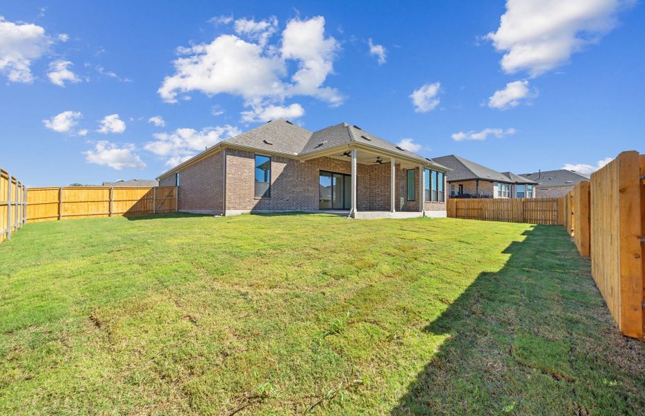 Exterior details and patio area of a home in 6 Creeks, Kyle (Image 30).