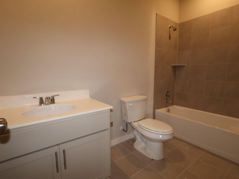 Furnished interior view inside a new home in Heritage, Dripping Springs (Image 5).