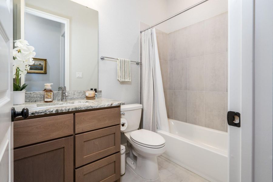 Third bathroom which is shared between the second and third secondary bedrooms. Third bathroom which is shared between the second and third secondary bedrooms.