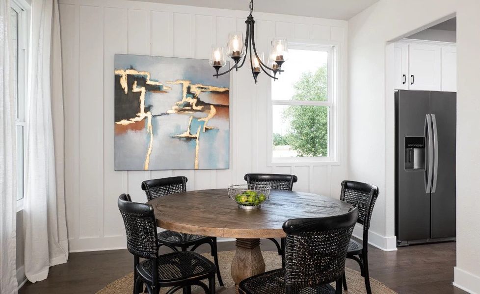 Representative furnished interior of a home built from the Blue Jay by Ashton Woods in Lariat, Liberty Hill (Image 8).