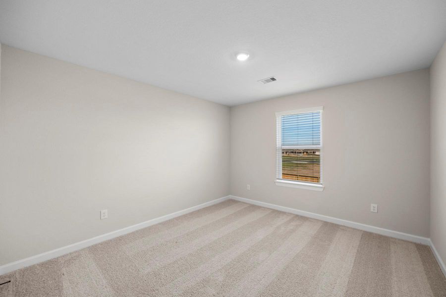 Spacious, unfurnished interior of a new home in Sunterra, Katy (Image 7).