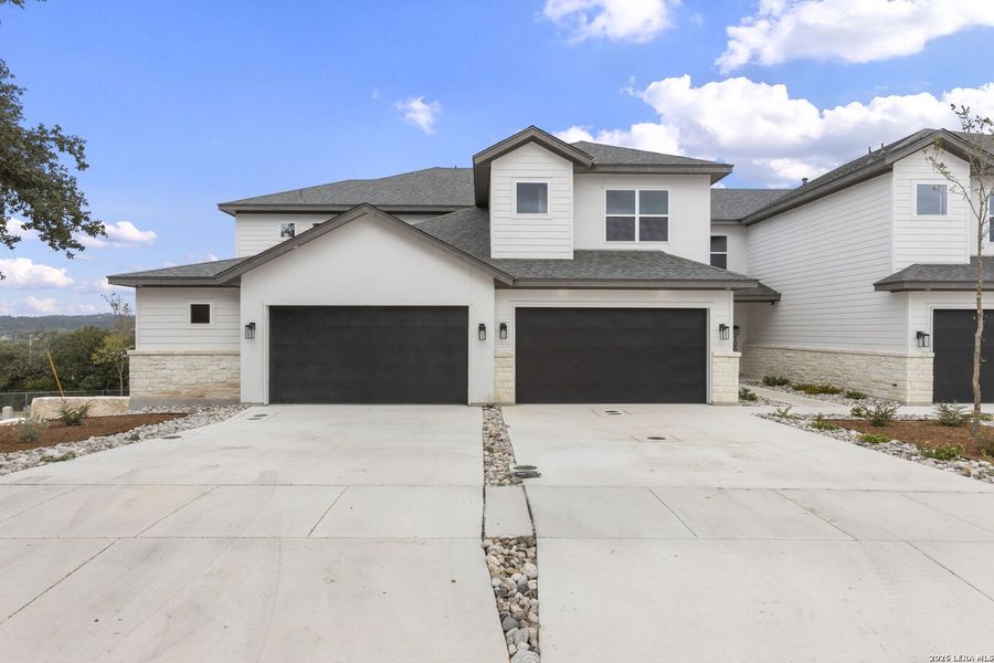 Front exterior of a new home in , Boerne, TX, highlighting curb appeal (Image 26).