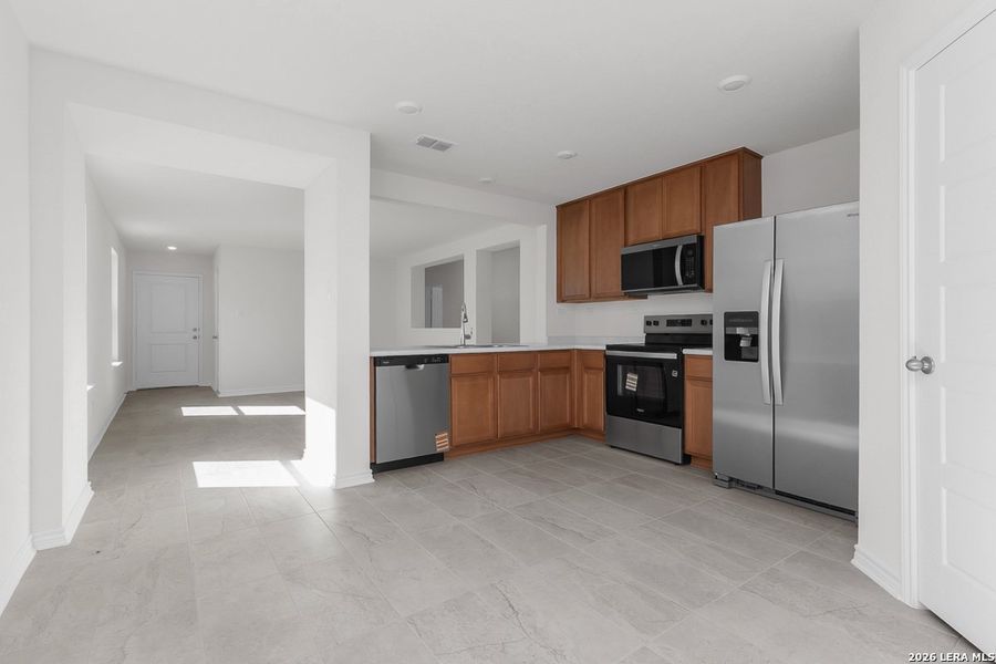 Furnished interior view inside a new home in Hidden Bluffs at TRP, San Antonio (Image 4).