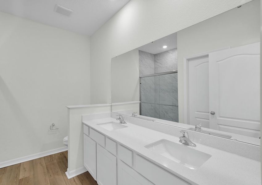 Get ready for your day in the master bathroom