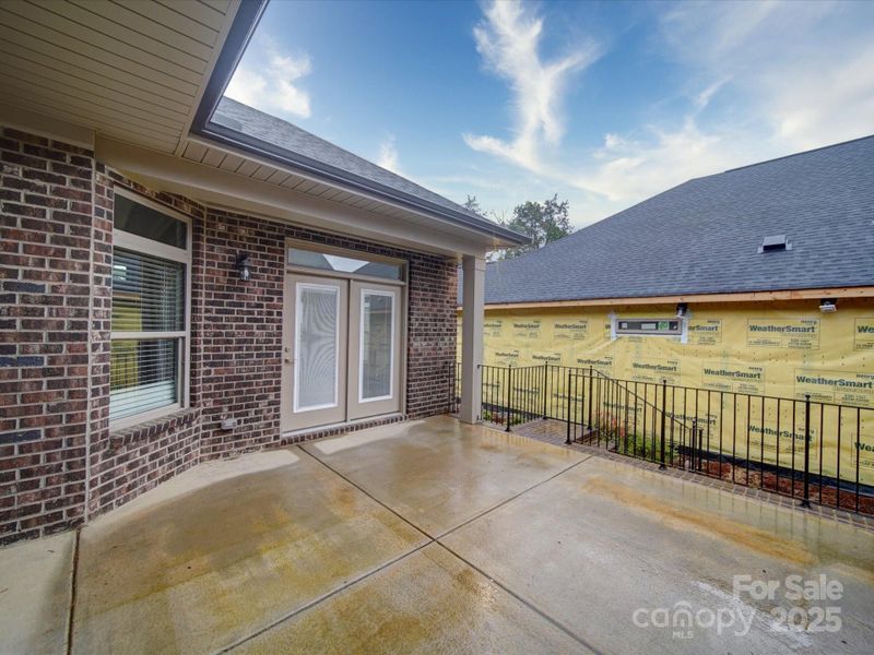 Exterior details and patio area of a home in The Courtyards on New Hope, Gastonia (Image 22).