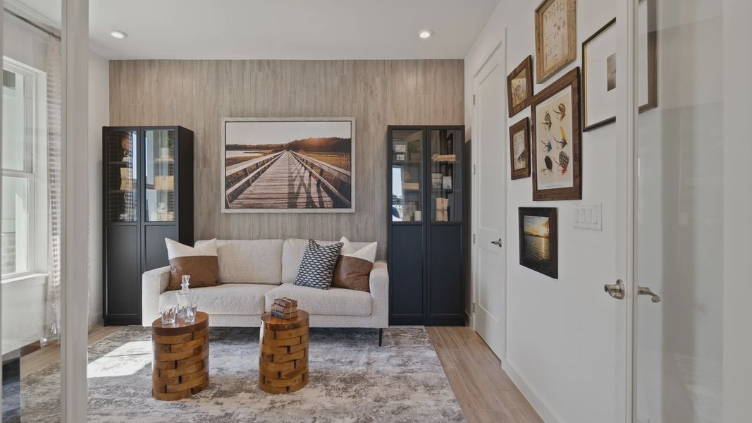 Front flex space/office with doors in a DRB Home Clementine model at the Trinity Place community.