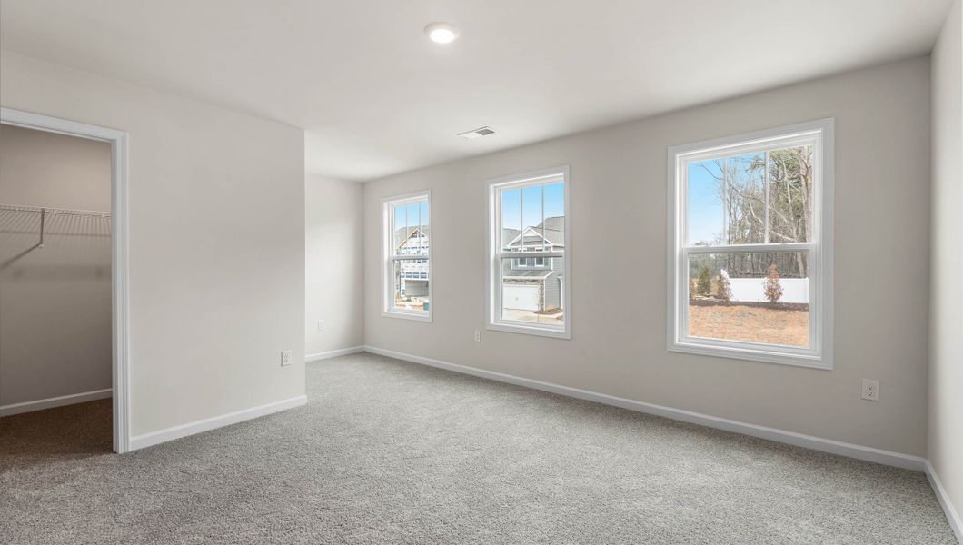 Spacious, unfurnished interior of a new home in Adams Glen, Greenville (Image 24).