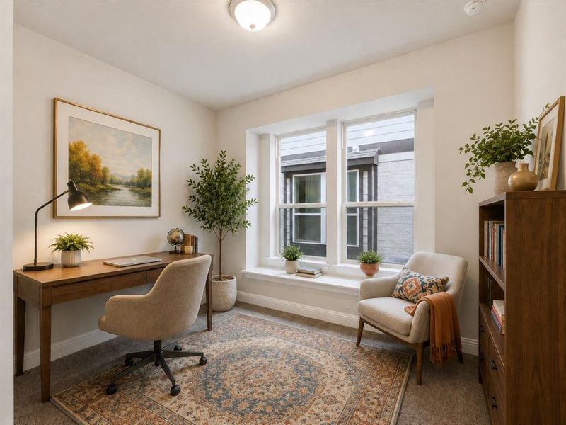Bright room featuring white walls, a multi-pane window with a deep sill, and carpeted flooring