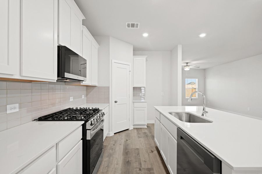 Furnished interior view inside a new home in Paloma at Sanford Farms, Waller (Image 9).