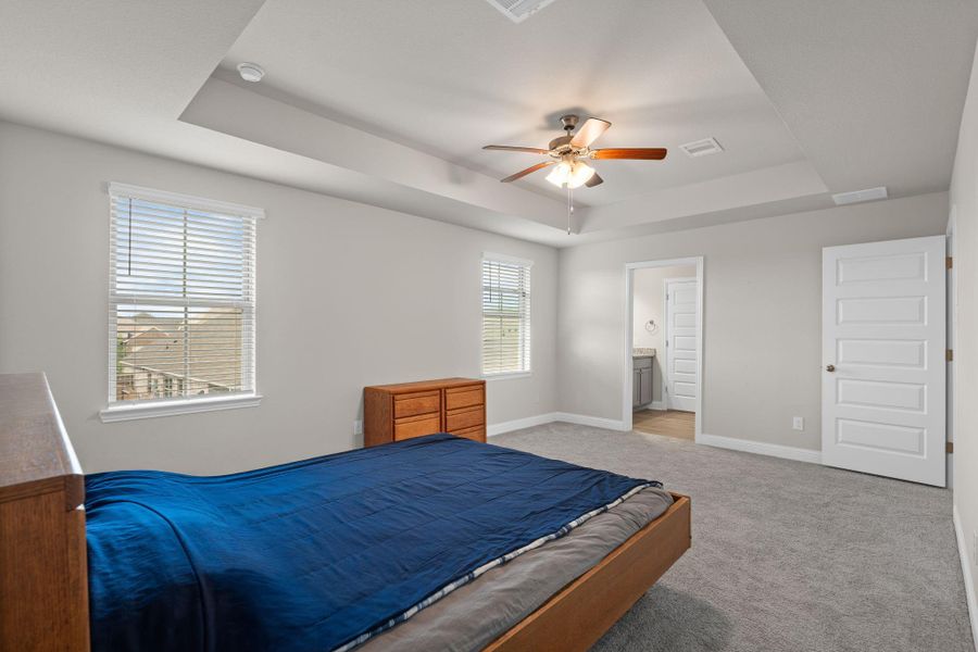 Furnished interior view inside a new home in Sunterra, Katy (Image 15).