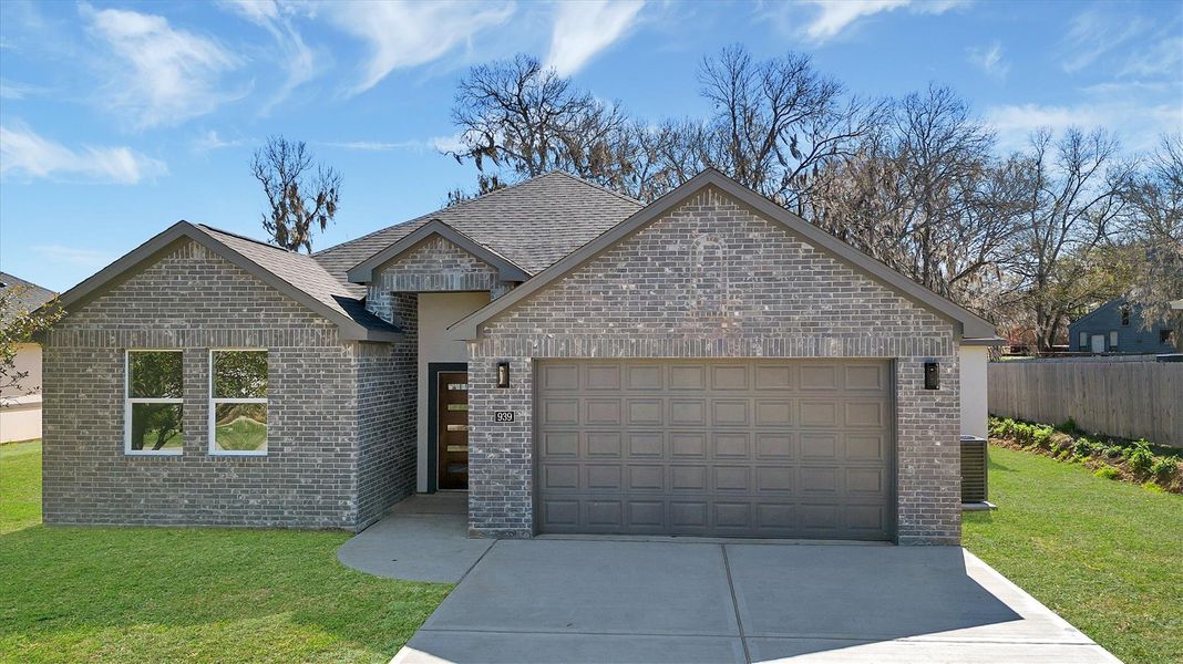 Front exterior of a new home in , Montgomery, TX, highlighting curb appeal (Image 25).