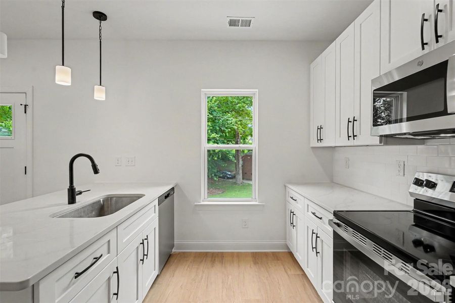 Furnished interior view inside a new home in , Charlotte (Image 6).