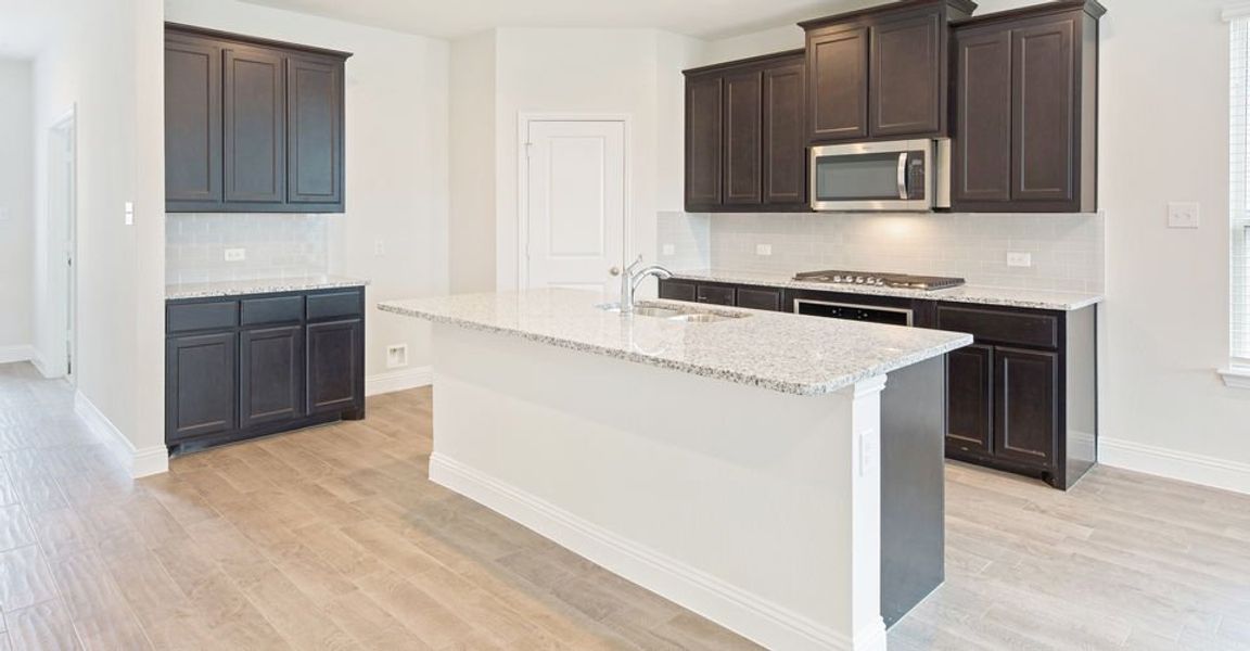 Representative exterior photo of a completed home built from the Stirling by Impression Homes in Timberbrook, Justin, TX (Image 10). Representative exterior photo of a completed home built from the Stirling by Impression Homes in Timberbrook, Justin, TX (Image 10).