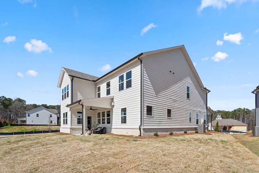 Representative exterior photo of a completed home built from the Sumner by Taylor Morrison in Bailey Fence, Dacula, GA (Image 27).