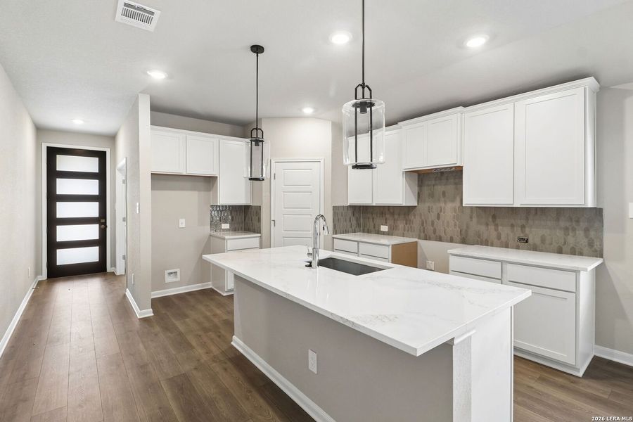 Furnished interior view inside a new home in Estancia Ranch - Premier Series, San Antonio (Image 14).