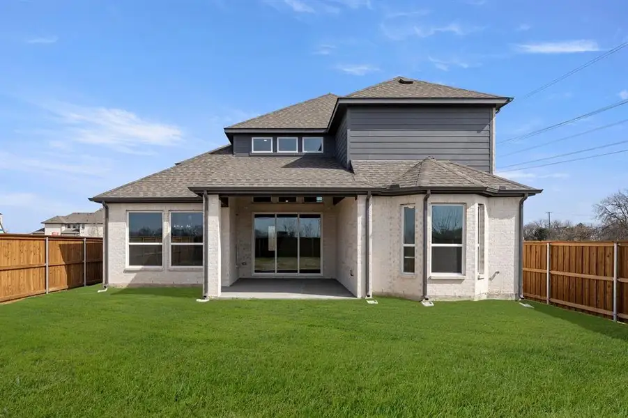 Exterior details and patio area of a home in Inspiration, Lucas (Image 4).