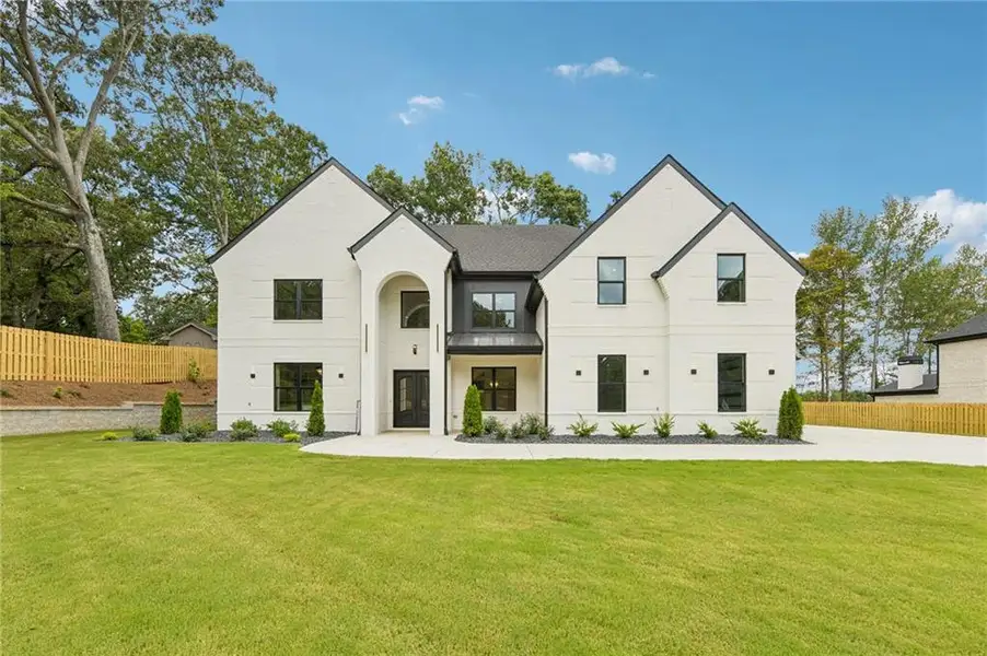Front exterior of a new home in , Hoschton, GA, highlighting curb appeal (Image 27).