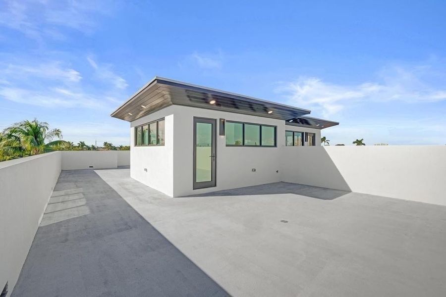 Rooftop Terrace — Private third-floor sanctuary with east, west, and southern exposures. Accommodates future needs such as generator placement and elevated mechanical equipment—enhancing resilience while preserving outdoor living below.