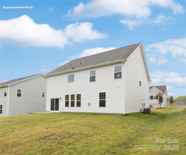Front exterior of a new home in Oak Grove Hill, Huntersville, NC, highlighting curb appeal (Image 23).