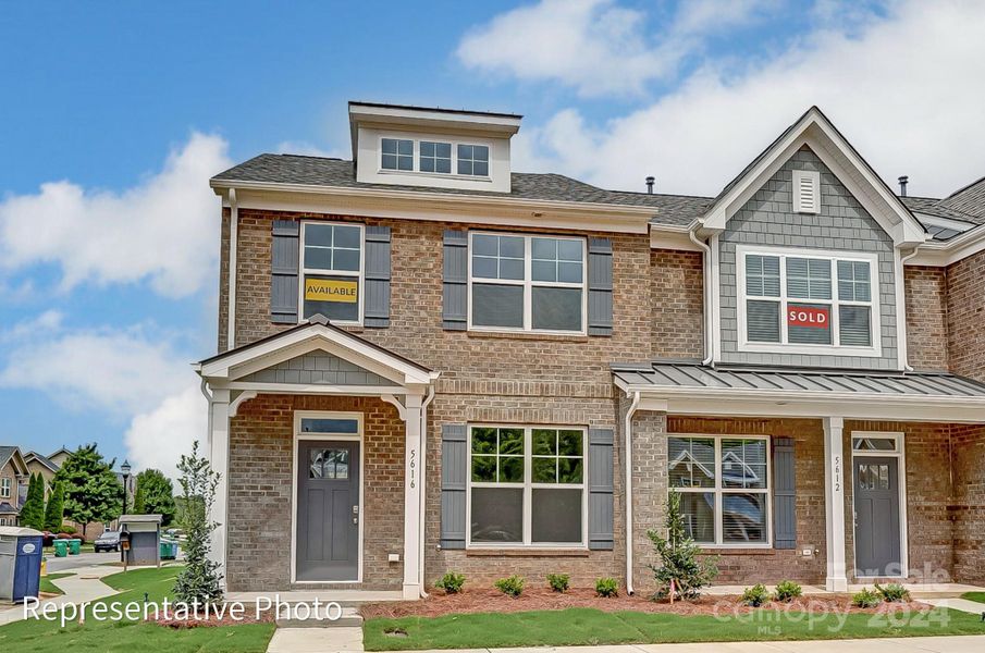 Homesite 33 features an Alston C floorplan with rear loard garage.