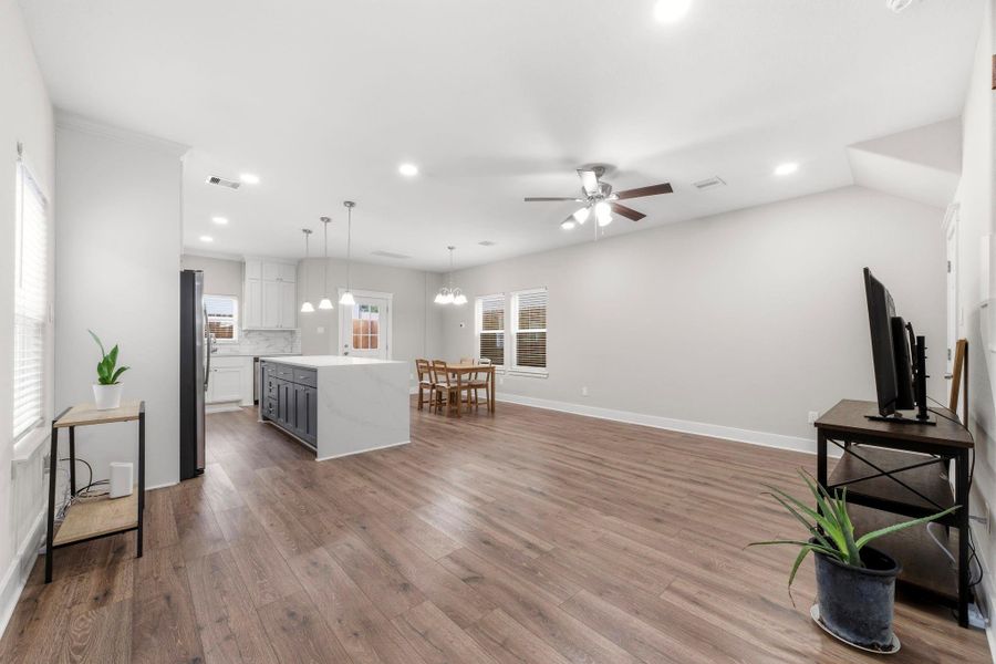 Enjoy the seamless flow between the living room, dining area, and chef's kitchen, creating the perfect gathering space.