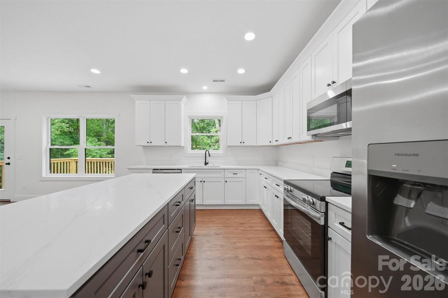 Furnished interior view inside a new home in , Lenoir (Image 5).