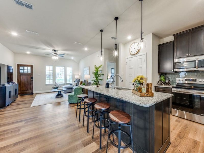 Photos shown are representative of similar construction and may include optional upgrades. Actual home may vary. Photos shown are representative of similar construction and may include optional upgrades. Actual home may vary.