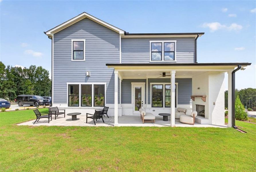 Exterior details and patio area of a home in Villages at Sharon Springs, Cumming (Image 22).