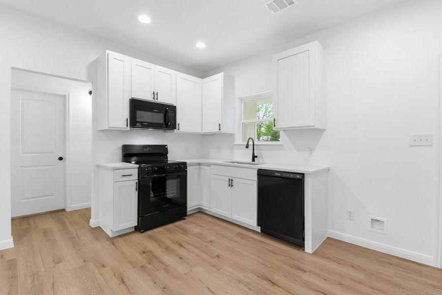 Modern kitchen with granite countertops