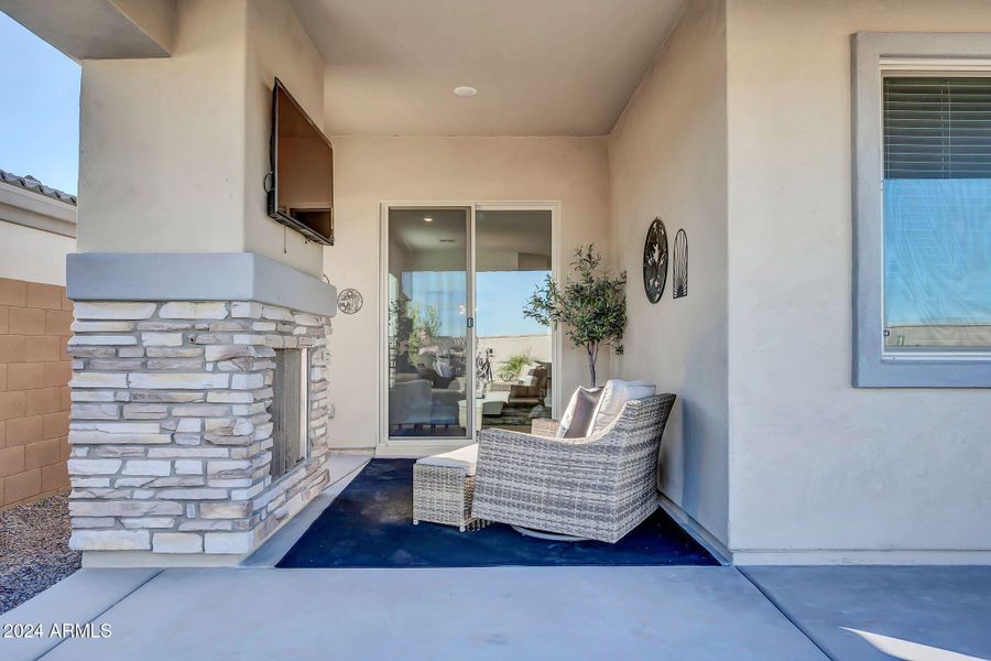 patio space with fireplace