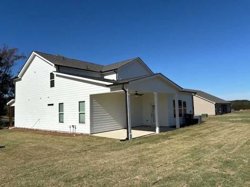 Exterior details and patio area of a home in Magnolia Ridge, Monroe (Image 2).