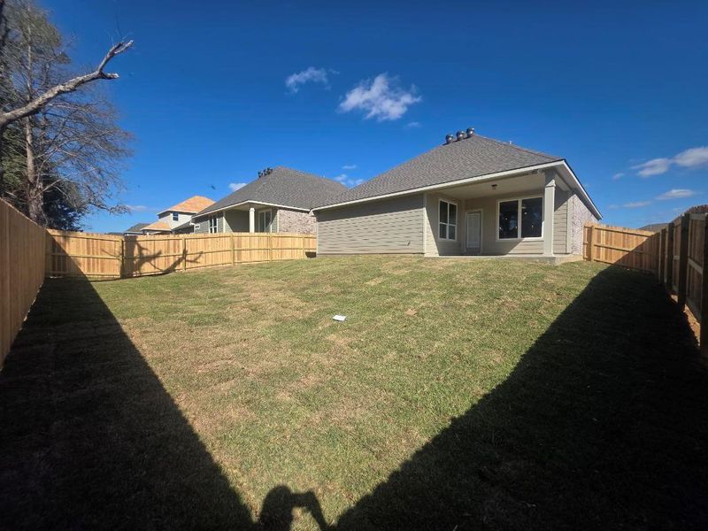Exterior details and patio area of a home in , Brenham (Image 11).
