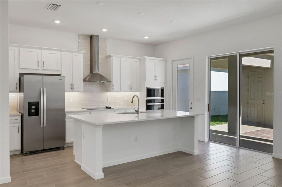 Furnished interior view inside a new home in Serenade at Ovation, Winter Garden (Image 15).