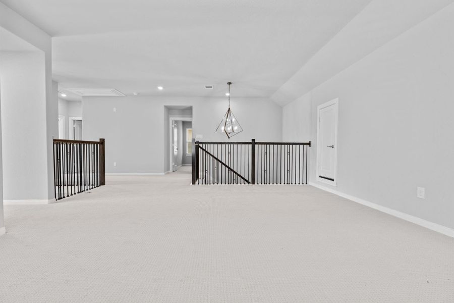 View of game room from the window over looking the stairs View of game room from the window over looking the stairs