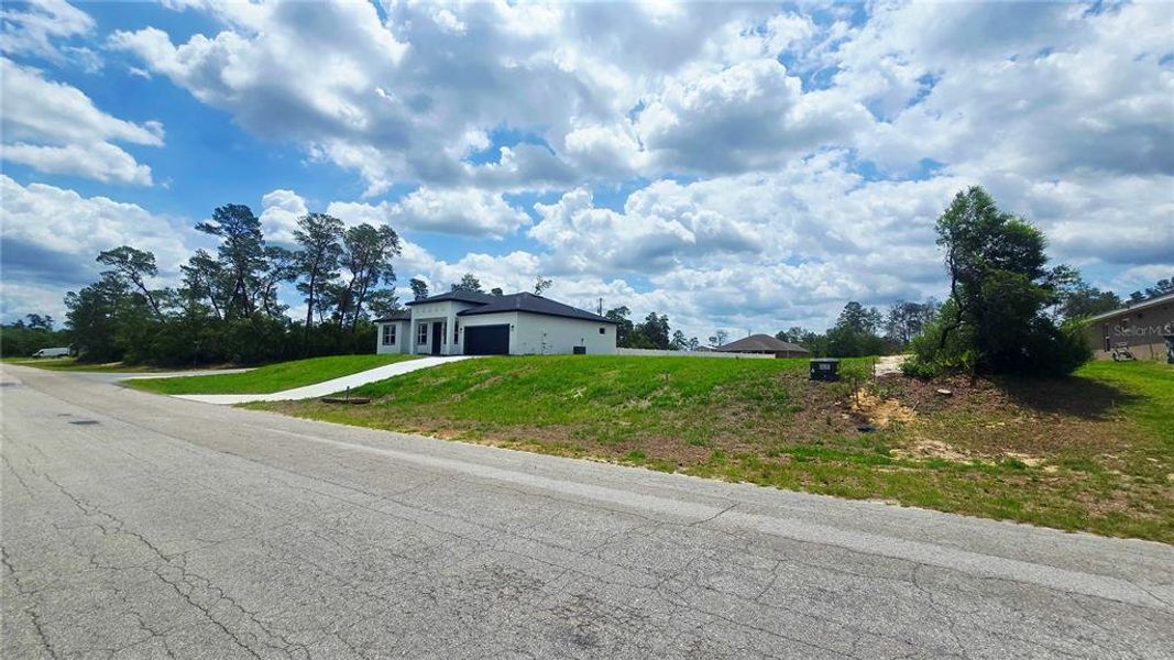 Front exterior of a new home in , Ocala, FL, highlighting curb appeal (Image 19).