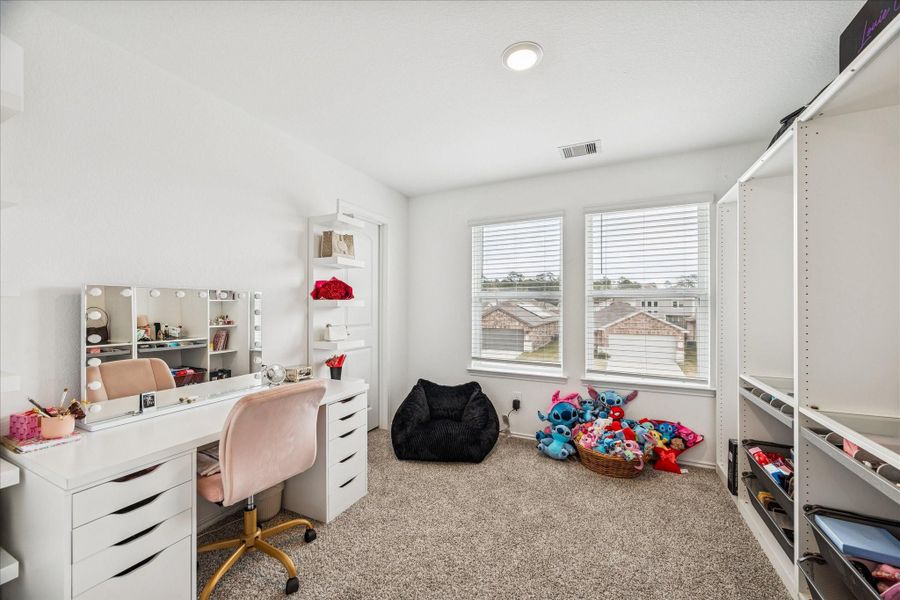 Furnished interior view inside a new home in Enclave at Dobbin, Magnolia (Image 14).