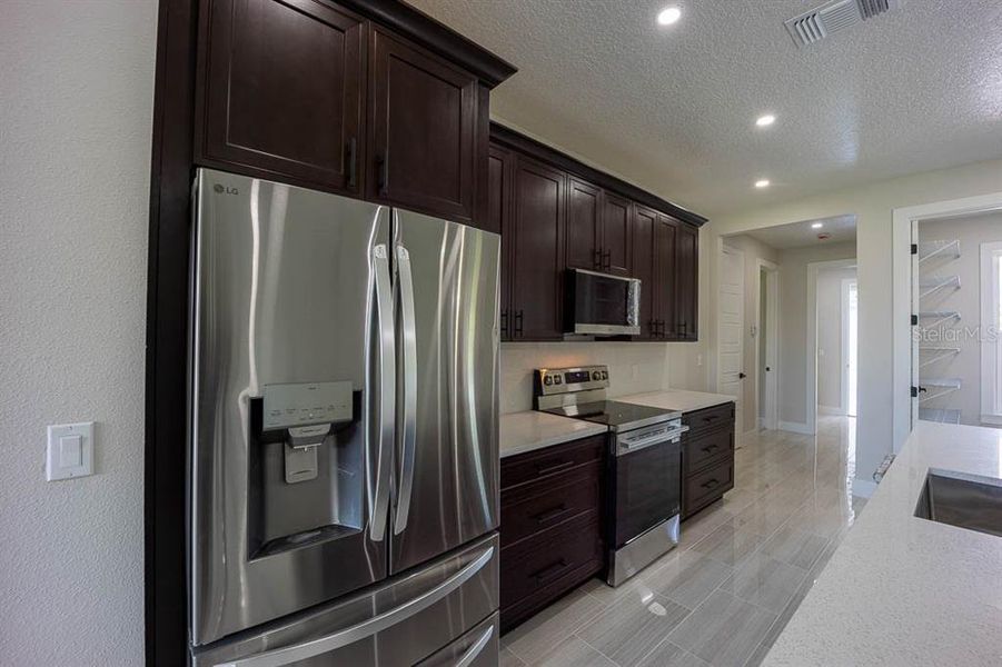 Furnished interior view inside a new home in , St. Cloud (Image 3).